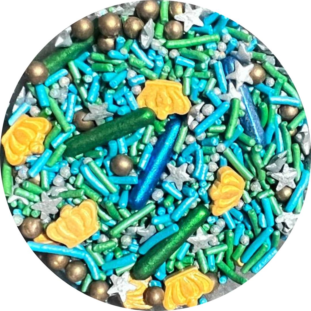Mix de sprinkles con corona dorada y rods azules y verdes