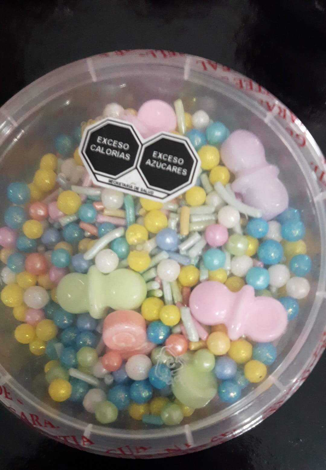 Mix de sprinkles con chupones baby shower