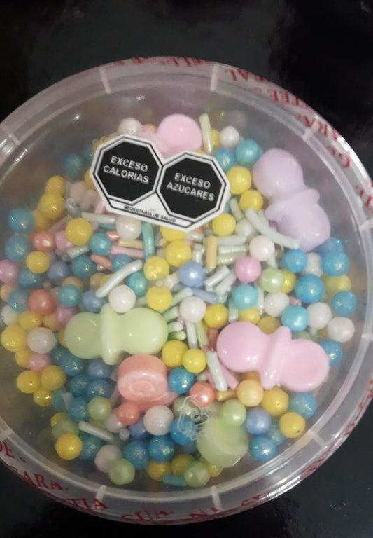 Mix de sprinkles con chupones baby shower